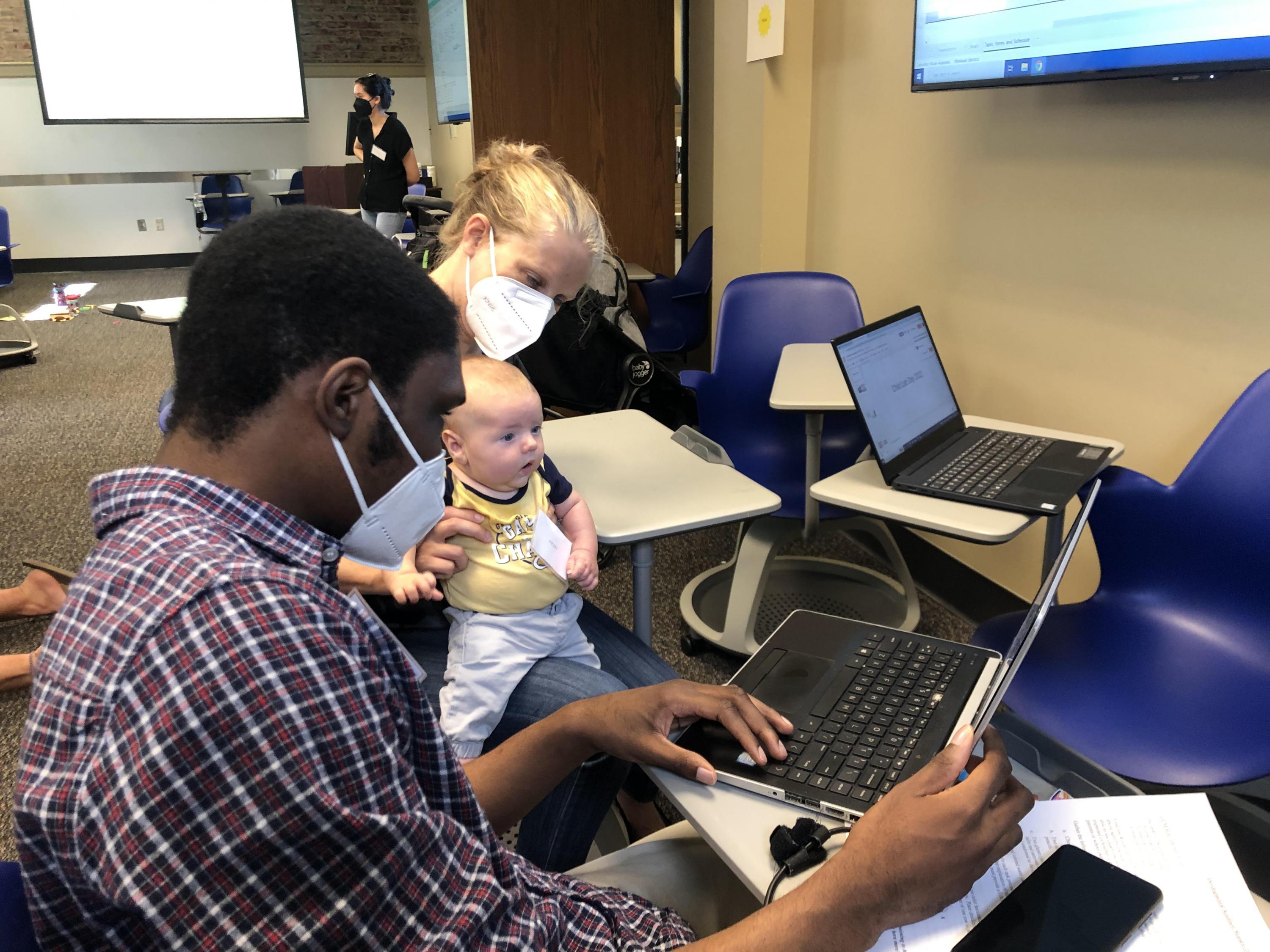 Students in the School of Psychology's Human Development class conduct assessment tests during Child Lab Day. (Photo Christopher Stanzione)