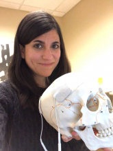 Students are often involved in Ragan's outreach efforts. Here, Ragan is holding a student-designed electroconvulsive-therapy model for a Brain Awareness Day event. Students are often involved in Ragan's outreach efforts. Here, Ragan is holding a student-designed electroconvulsive-therapy model for a Brain Awareness Day event.