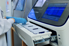 DNA samples are loaded into the Sanger processing machine. DNA samples are loaded into the Sanger processing machine.
