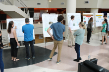 Students attending the Aquatic Chemical Ecology REU prepare for poster session presentations July 20. (Photo Renay San Miguel) Students attending the Aquatic Chemical Ecology REU prepare for poster session presentations July 20. (Photo Renay San Miguel)